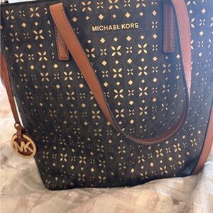 Michael Kors Perforated Black and Tan Tote